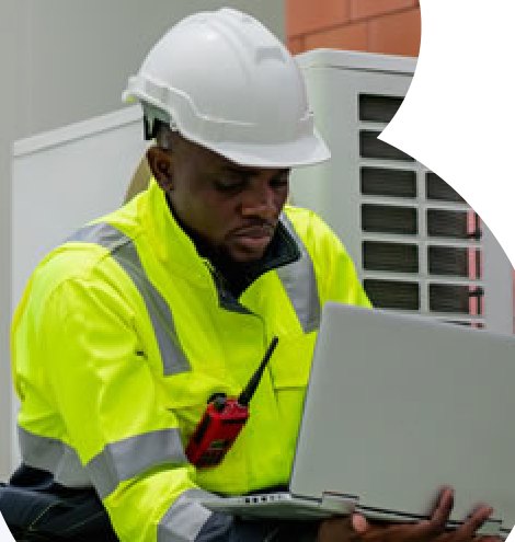 Telecommunication engineer with laptop at site